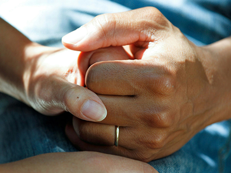 hand_holding_support_stock_image_600x375